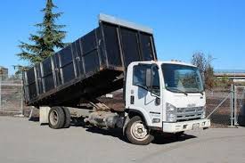 Best Construction Debris Removal  in Belmond, IA